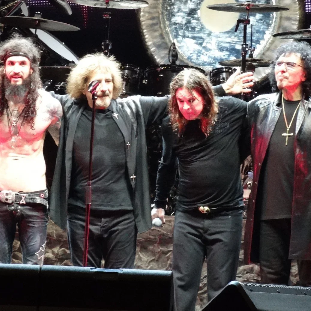 Black Sabbath on stage, 2013: Butler, Osbourne, Iommi