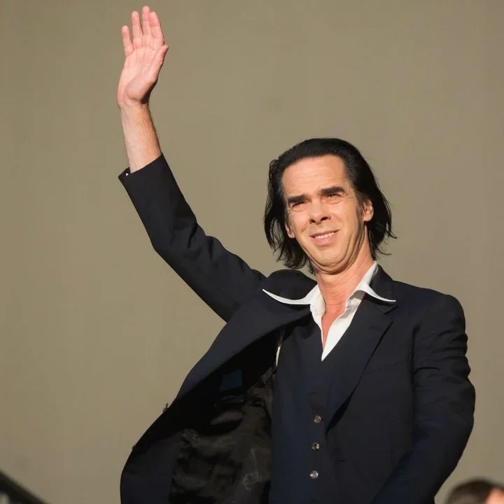 Nick Cave waving to the crowd